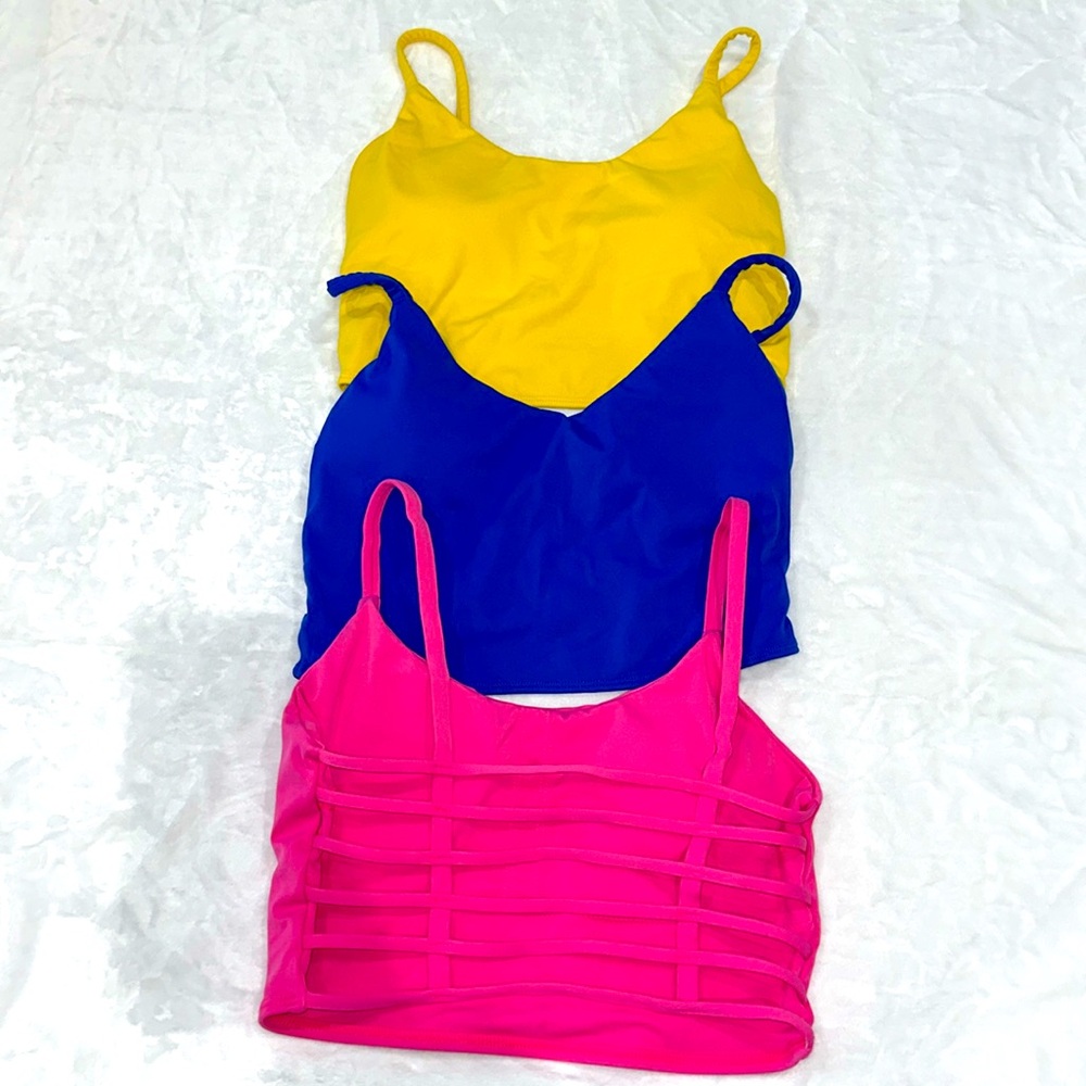 3 sports bras unsure of brand
